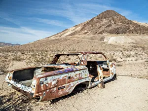 Abandoned car in Rhyolite, a ghost town in Nye County, near Death Valley National Park, Nevada, USA