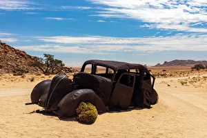 An Abandoned car that was shot down in a Diamond Heist in 1934 within Aus Vista, Namibia