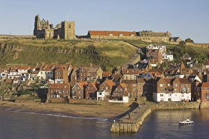 Abbey ruins, church, sandy beach and harbour, Whitby, North Yorkshire, Yorkshire