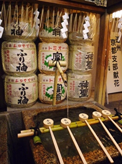 Shinto Prints: Ablution ladles at the entrance of a Shinto shrine, Kyoto, Japan, Asia