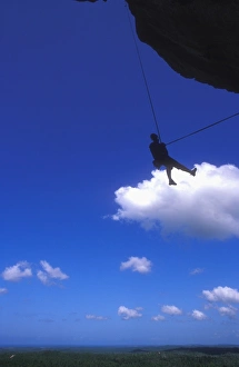 Images Dated 9th April 2009: Abseiling above the jungle from the overhanging cliffs of La Costanera
