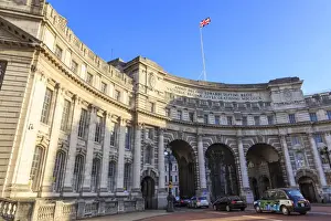 Neoclassical Prints: Admiralty Arch with traffic leaving The Mall and Union Flag flying, late autumn sun