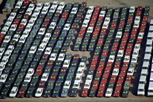 Aerial of cars lined up on the docks at the port of