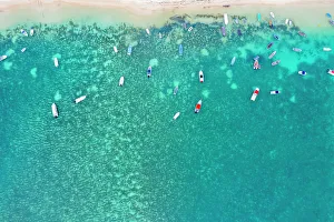 Lagoon Gallery: Aerial by drone of boats in the turquoise water of lagoon front of Mont Choisy beach