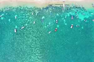Mauritius Prints: Aerial by drone of boats in the turquoise water of lagoon front of Mont Choisy beach
