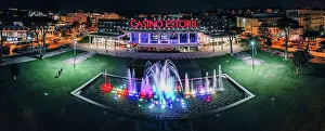 Streetlights Prints: Aerial drone panoramic view of Casino Estoril at night