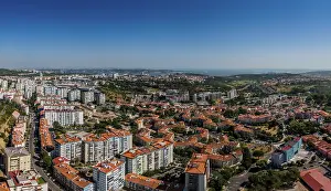 Lisbon Prints: Aerial drone view of geometric Soviet-era apartment blocks in Carnaxide district in Lisbon