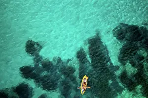 Kayaking Prints: Aerial drone above view of a kayak on the turquoise water of Mediterranean Sea