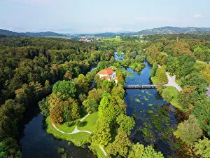 Sustainability Prints: Aerial drone view of Otocec Castle, 13th to 17th century construction, Slovenia, Europe