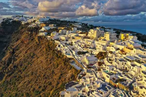 Aerial of Fira at sunset, Santorini, Cyclades, Greek Islands, Greece, Europe