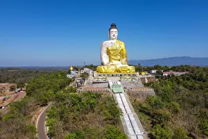 Myanmar Prints: Aerial of a giant sitting Buddha below the Kyaiktiyo Pagoda (Golden Rock), Mon state