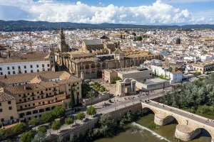Cityscapes Prints: Aerial of the Historic Roman Bridge and Mezquita
