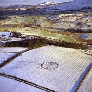 Circular Prints: Aerial image of Castlerigg Stone Circle, a prehistoric monument in snow