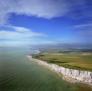 Light House Prints: Aerial image of chalk cliffs and lighthouse at Beachy Head, near Eastbourne