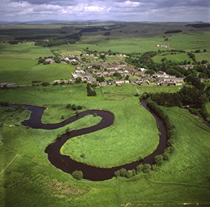 Curve Prints: Aerial image of Otterburn, on the banks of the River Rede, Northumberland