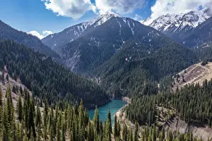 Aerial of the Kaindy Lake with its dead trees, Kolsay Lakes National Park, Tian Shan mountains, Kazakhstan, Central Asia, Asia