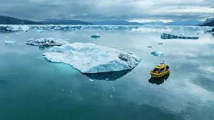 Outdoor Activities Prints: Aerial of a little boat anchoring in the Nuuk Icefjord