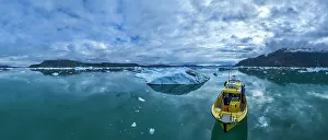 Yachting Prints: Aerial of a little boat anchoring in the Nuuk Icefjord