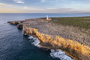 Lighthouses Prints: Aerial morning view of the white lighthouse of Capo Murro di Porco on the peninsula Maddalena
