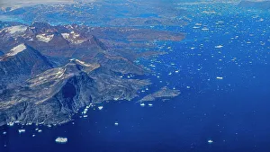Eco Tourism Prints: Aerial of the mountainous coastline around Kulusuk, Greenland, Polar Regions
