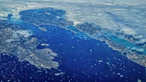 Isolated Prints: Aerial of the mountainous coastline around Kulusuk, Greenland, Polar Regions