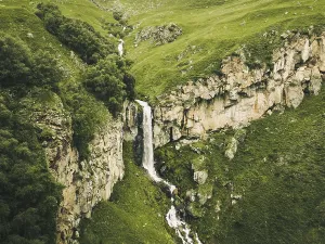 Waterfalls Prints: Aerial panorama Arsha waterfall stream in green caucasus mountains