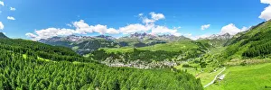 Valtellina Prints: Aerial panoramic of the alpine village of Madesimo surrounded by green woods