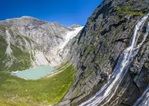 Drone Shot Prints: Aerial panoramic by drone of waterfall above Briksdalsbreen glacier, Loen, Jostedalsbreen
