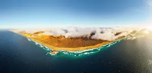Hour Prints: Aerial panoramic of golden sand of Cofete beach washed by the crystal sea