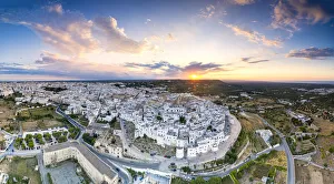 Old Towns Prints: Aerial panoramic of Ostuni at sunset, province of Brindisi, Salento, Apulia, Italy