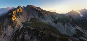 Mont Prints: Aerial and panoramic view of Grand Seru and Mont Thabor at sunrise during summer