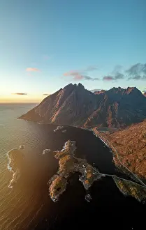 Moskenesoya Prints: Aerial panoramic view of majestic mountains overlooking the sea at dawn
