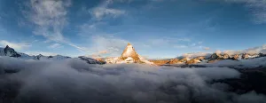 Aerial panoramic view of Matterhorn in autumn fog at dawn, Zermatt, Valais canton, Switzerland, Europe