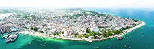 Zanzibar Prints: Aerial panoramic view of Stone Town and the clear water of the Indian Ocean