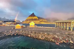 Sakrisoy Prints: Aerial panoramic view of traditional rorbu and Olstind peak under the rainbow