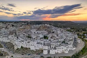 Salento Prints: Aerial panoramic of white buildings in the old town of Ostuni at sunset