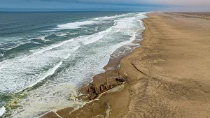 Angola Prints: Aerial of a shipwreck on a beach in the Iona National Park, Namibe, Angola, Africa