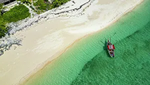 Zanzibar Prints: Aerial of a traditional Dhow on a white sand beach