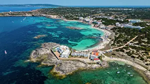 Formentera Prints: Aerial of the turquoise waters and white sand beach of the Pujols beach