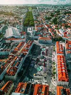 Discover Prints: An aerial vertical drone perspective of city center with Rossio Square leading to Restauradores