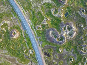 Volcanoes Prints: Aerial vertical view of old volcano and asphalt road