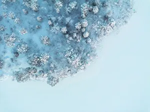 Finland Prints: Aerial vertical view of a snow-covered lake with a trees, Muonio, Finland, Europe