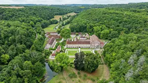 Retreat Prints: Aerial view of Abbey of Fontenay showcasing its structures and surrounding forest in France
