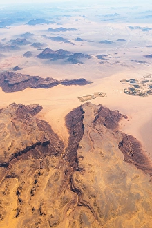 Arabia Prints: Aerial view from an aircraft of the desert in AlUla region, Medina Province, Saudi Arabia