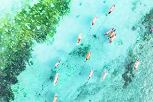 Rope Prints: Aerial view of anchored boats in the exotic blue lagoon