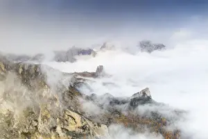 Belluno Prints: Aerial view of autumn mist over the trees and woods surrounding Cinque Torri and Tofane