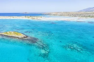 Aerial view of the blue sea surrounding Elafonisi beach, Crete island, Greek Islands, Greece, Europe