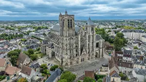 Significance Prints: Aerial view of Bourges Cathedral showcases its grand architecture amid the city landscapes in France