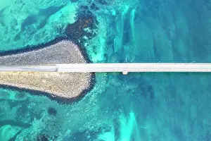 Aerial view of the bridge linking islands crossing the fjord with turquoise Arctic water, Flakstadburene, Fredvang, Lofoten Islands, Norway, Scandinavia, Europe