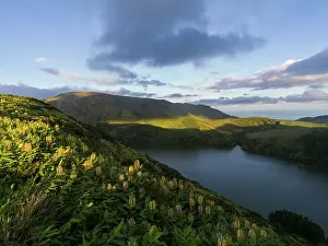Aerial view of Caldeira Funda lake in Flores Island at sunset, Azores islands, Portugal, Atlantic, Europe